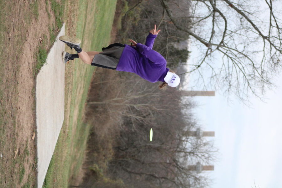 Local playing on the new disc golf course.