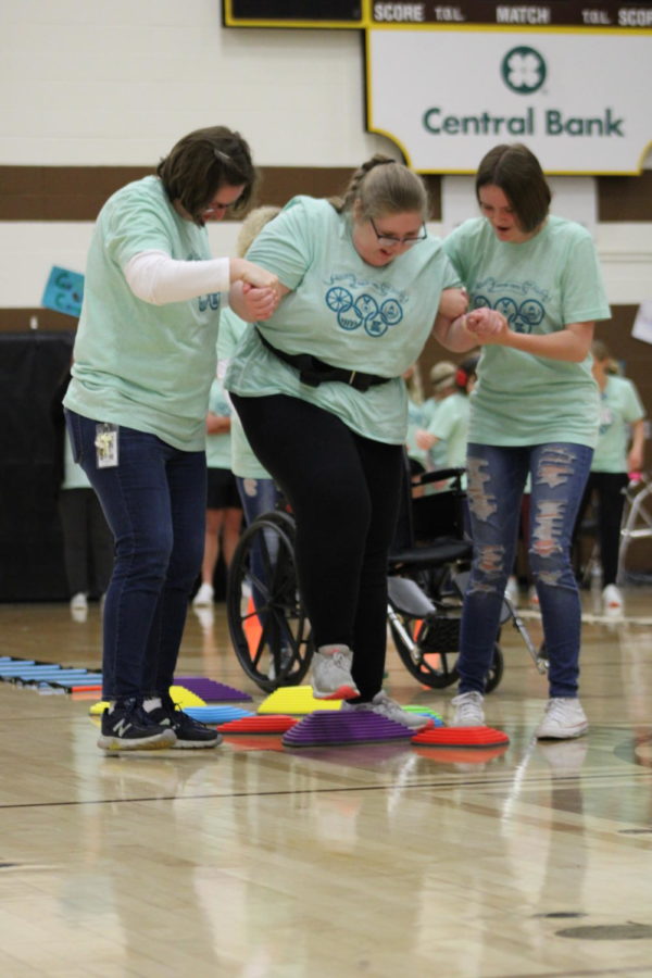 Although some special education students are wheelchair bound, Haley decided she wanted to try and complete the obstacle course standing.