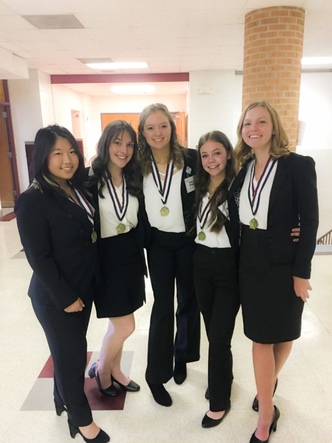 HOSA+state+qualifiers+stand+together+with+their+medals.+Photo+courtesy+of+Mrs.+Janson.