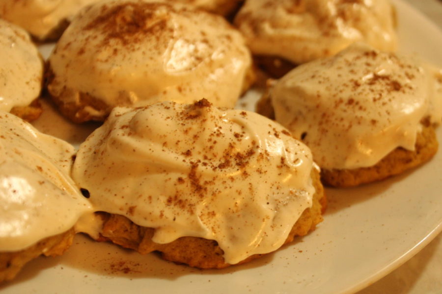 Pumpkin+cookies+with+cream+cheese+frosting+and+cinnamon+sprinkled+on+top.+