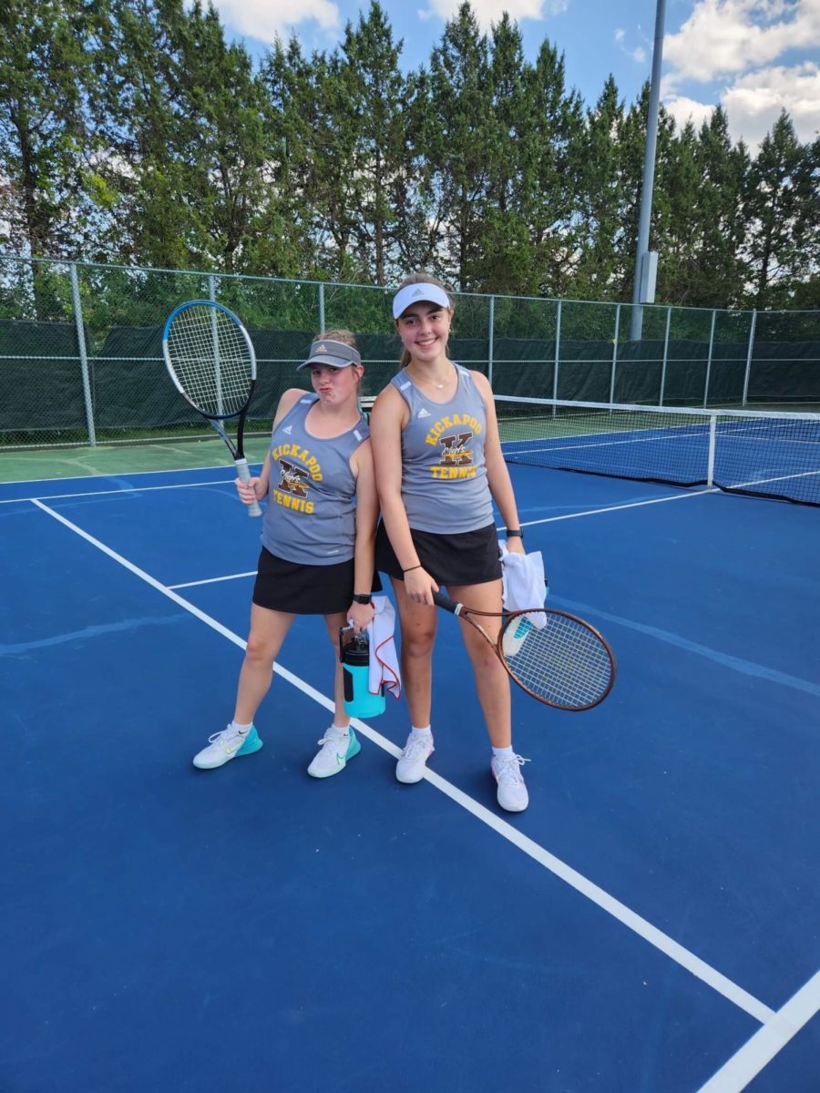 Doubles team Windsor Brotherton and Leah Martin stand side by side after a match. 