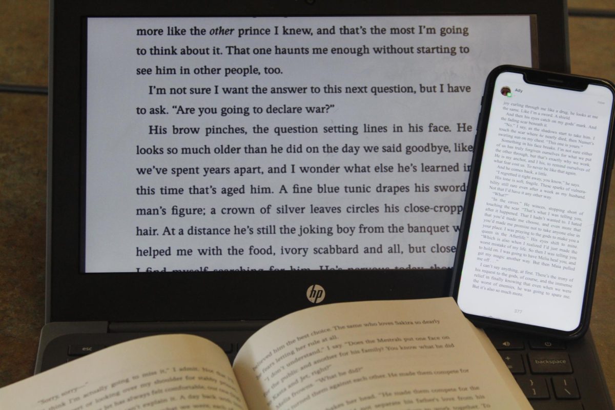 The difference shown between reading an e-Book and a physical book is that e-books come with multiple distractions. 