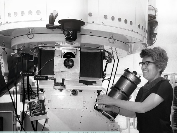 Vera Rubin working with a spectrograph, this work will discover groundbreaking information about dark matter