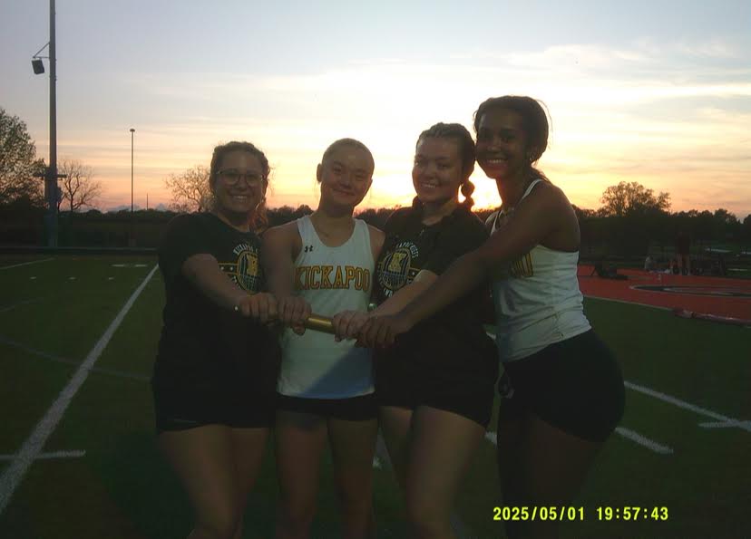 Girls celebrate at their Republic-Relays Meet Throwers Relay.