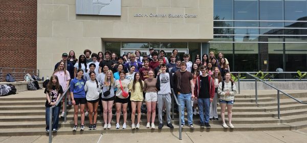 Students standing outside of Pittsburg State University on Science Day. 