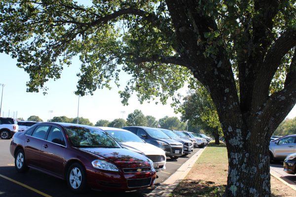 The parking lot is packed as soon as school starts, leaving no room for other students to park. 
