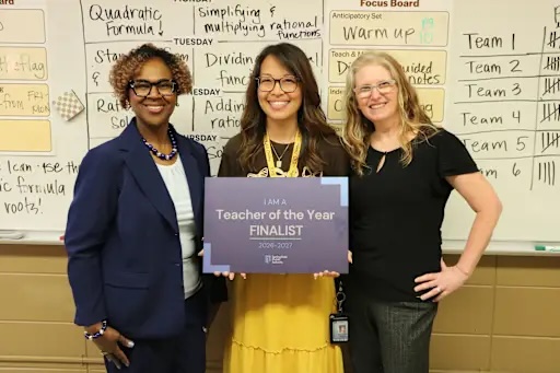 Neuber receiving recognition as a finalist for teacher of the year. Photo courtesy of SPS website. 