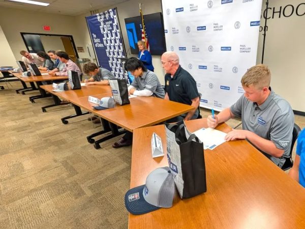 Students signing with the program on April 27th. (Photo courtesy of the Springfield Business Journal)