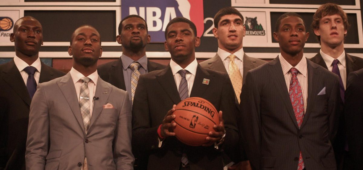 Kyrie Irving (center), was the first overall pick in the 2011 NBA Draft, going to the Cleveland Cavaliers. With the help of two more first overall picks in 2013 and 2014, Cleveland lured All-Star LeBron James back to Cleveland (photo courtesy of Wikimedia Commons).
